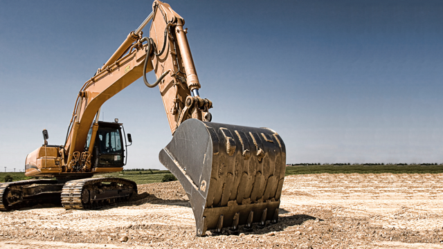 image of construction excavator preparing to dig